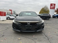Sporting the performance-oriented 2021 Honda Accord Sedan Sport 2.0 in captivating Crystal Black Pea... (image 1)