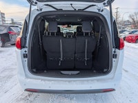 The 2026 Chrysler Grand Caravan SXT in Bright White with a Black interior offers the perfect blend o... (image 5)