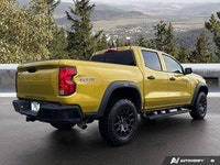 Unleash robust capability with this 2023 Chevrolet Colorado 4WD Trail Boss, presented in striking Ni... (image 4)
