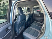 The 2021 Ford Bronco Sport Outer Banks in a striking blue finish with its capable 4x4 drivetrain off... (image 9)