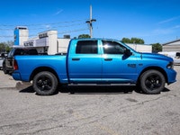 The 2021 Ram 1500 Classic Express 4x4 Crew Cab 57 Box is ready to tackle any road with its striking... (image 2)