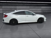 The 2020 Honda Civic Si Sedan in white offers a dynamic driving experience with its FWD drivetrain a... (image 8)