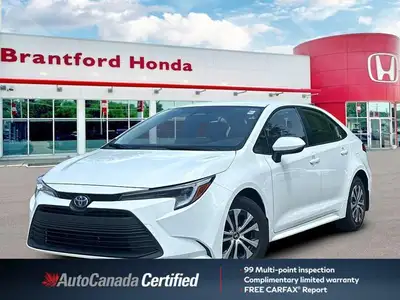 Drive further and smarter with this exceptional 2025 Toyota Corolla Hybrid LE, now available with ju...