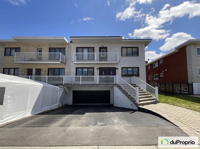 $1,049,000 - Duplex for sale in St-Leonard — photo 1