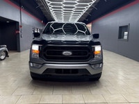 Experience the renowned 2022 Ford F-150 XLT 4x4 SuperCrew in a striking Silver finish, built for bot... (image 3)