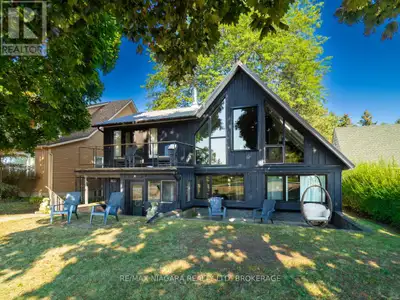 A rare find on the shores of Lake Erie! Overlooking Gravelly Bay, this beautifully updated waterfron...