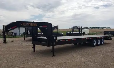 2026 Rainbow Gooseneck Trailer 3 - 7000 lb spring axles 25' deck plus 5' beavertail Full width flip...