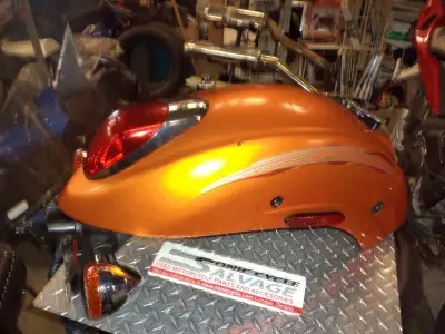 sonic cycle has a 2012 kawasaki vn -900 custom vulcan rear fender with tail light and signals very n...