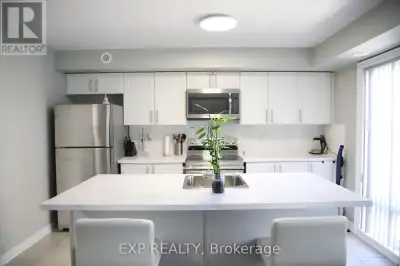 Fabulous Bright & Spacious Corner Townhome in a Prime Location! This Stunning Open Concept End Unit...