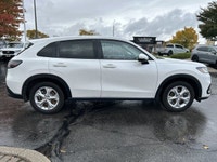 The pristine Platinum White Pearl exterior of this 2024 Honda HR-V LX-B instantly captivates. With j... (image 3)