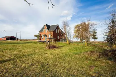 A beautiful rural property directly on Highway 10 sitting on approx. 3.15 acres (200 ft x 687 ft). C...