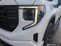 Experience the 2026 GMC Sierra 1500 in a striking white finish and robust 4x4 drivetrain that assure... (image 9)
