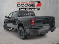 This Ram 1500 has a strong Gas/Electric V-8 5.7 L/345 engine powering this Automatic transmission. T... (image 3)