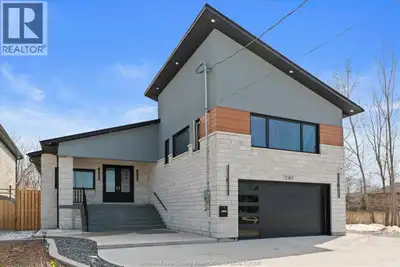 Welcome to this Stunning Custom, R-Ranch with Bonus room home. This massive raised ranch in the hear...