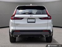 The 2026 Honda CR-V Hybrid EX-L AWD, dressed in a sophisticated white exterior and outfitted with a... (image 4)