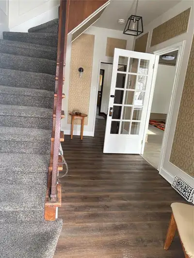 D21//Brandon/Welcome to this centrally located character home filled with charm! With 5 bedrooms and...