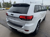 Our exclusive 2021 Jeep Grand Cherokee Limited 4X4 wraps assertive capability in a dramatic Bright W... (image 4)