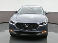 The 2024 Mazda CX-5 GS is praised for its fun driving experience, engaging performance, and high-qua... (image 2)