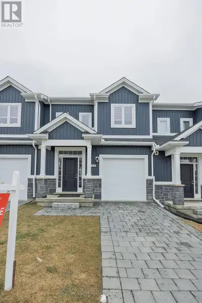 5 year young 3 bedroom townhouse with single car garage vacant land condo no condo fees in popular H...