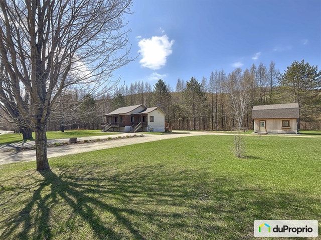 $589,000 - Bungalow for sale in Huberdeau — photo 1