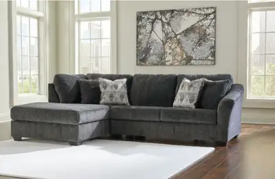 Bring fashionable function to the forefront with the Biddeford sectional with chaise. A transitional...