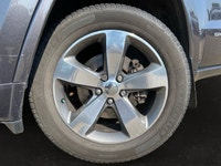 This Jeep Grand Cherokee has a dependable Regular Unleaded V-8 5.7 L/345 engine powering this Automa... (image 6)