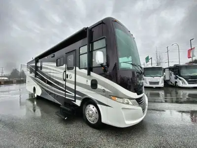 Step into this Allegro 36 LA class A motorhome to find two captain's chairs and overhead cabinets at...