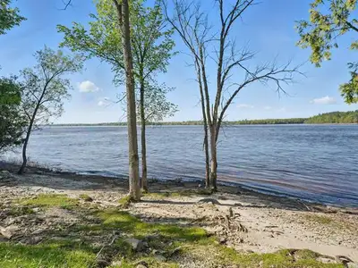 Discover 6 pristine acres of Ottawa River waterfront with 400 feet of rocky/sandy shoreline. This va...