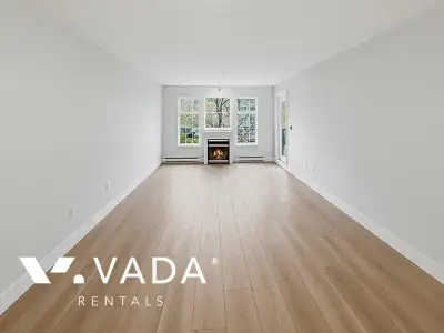 Recently renovated, this inviting home features laminate flooring throughout, a spacious living room...
