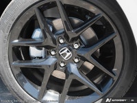 Introducing the 2026 Honda Civic Hybrid in a stunning white finish, this new sedan promises sophisti... (image 7)