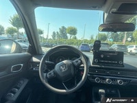 Perfectly blending efficiency with smart technology, the 2023 Honda Civic Sedan LX arrives ready for... (image 8)