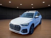 The 2021 Audi Q5 Komfort 45 TFSI quattro boasts a stunning white exterior that is both timeless and... (image 1)