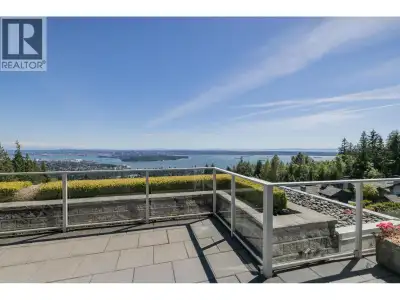 Perched above it all in the prestigious Boulders at Whitby Estates, this exceptional penthouse offer...