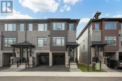 This modern, 3-storey end-unit townhouse by Losani Homes offers stylish living with an abundance of...