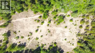 Prime Development Opportunity in South Castlegar. This expansive 6-acre property, ideally situated n...