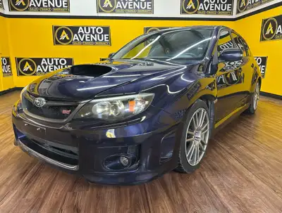 This impressive 2011 Subaru Impreza WRX STI is proudly offered by Auto Avenue Airdrie. Built for dri...