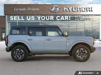 Embrace the spirit of adventure with the 2022 Ford Bronco. This stunning Shadow Black convertible is... (image 6)