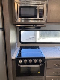 East to West Alta with bunkroom! This trailer features 2 slides, one in the main living area and ano... (image 9)