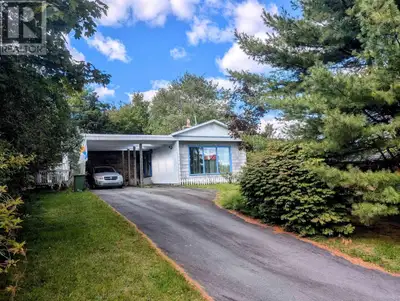 3 Bedroom bungalow with carport. features main floor family room, main floor laundry, large backyard...