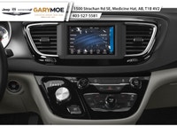 The 2026 Chrysler Grand Caravan SXT in a captivating black hue is the front-wheel drive van designed... (image 6)