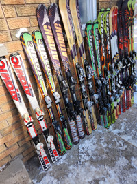 Sets of Atomics Skis any mountain With  Bindings and Boots.