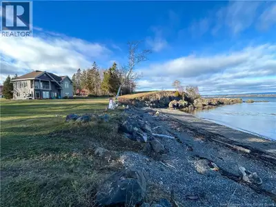 Experience waterfront living with this bright two-story home built in 2015 on a solid slab foundatio...