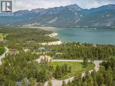 BIG VIEWS. EASY BUILD. BELLA VISTA LIVING. Perched high above Columbia Lake, this exceptional lot in...