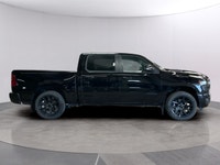 Presenting the stunning 2026 Ram 1500 Sport in an elegant black finish, equipped with a robust 4x4 d... (image 5)