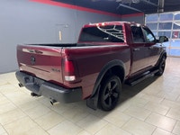 The 2021 Ram 1500 Classic Warlock 4x4 Crew Cab with a 57 Box is an eye-catching powerhouse in its vi... (image 6)