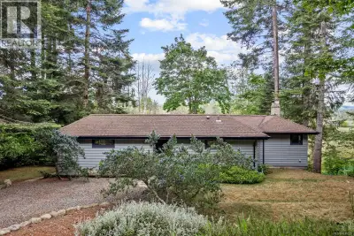Tucked away on a private half-acre in the heart of Ships Point, this enchanting retreat is a love le...