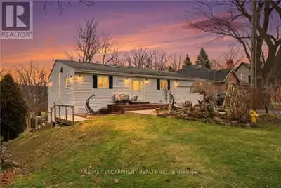 Beautifully maintained bungalow with over 2,000 sqft of finished living space, complete with an in-l...