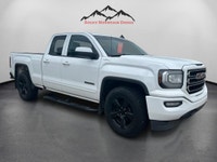 The 2019 GMC Sierra 1500 Limited 4WD Double Cab Standard Box in a striking white color is a robust t... (image 7)