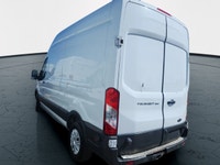 The 2017 Ford Transit Cargo Van in white with an automatic transmission and RWD drivetrain is specif... (image 5)