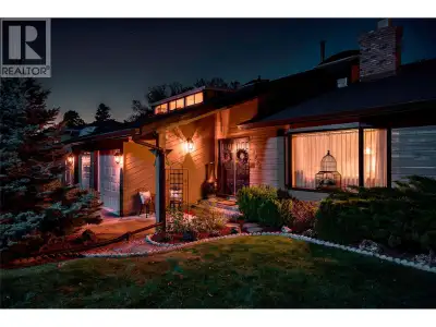 Perched on a quiet street on the Bench, this spectacular executive home offers the kind of warmth, c...